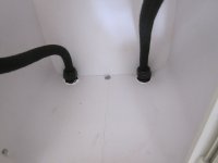 _hoses_sealed_by_bulkhead_fittings_drain_at_bottom.jpg