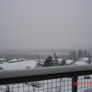18 December Bellingham 
Looking northwest. Wind is 
picking up and blowing 
the snow off of the rooftops.