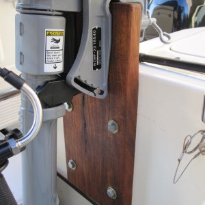 Used a piece of 4 quarter teak. Bolted to port lazarette. These bolts were later replaced with SS carriage bolts.