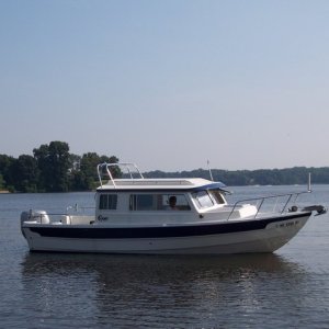 Miss Curious At Home On The Magothy River In MD With Radar Arch and Anchor Windlass Visible