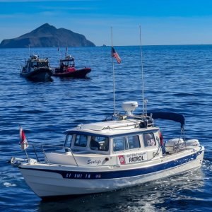 At CG Memorial Seervice off Santa Cruz Island.  Serving as official photo boat for the event.