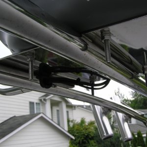 Wire run thru port arch w rubber grommet.