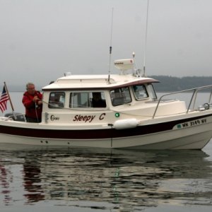 SleepyC at the Port Townsend Rowing races June 2010.  Photo and safety boat service, able co-skipper Dan D from Serenity.
