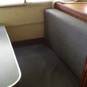 Bench seat forward of dining table