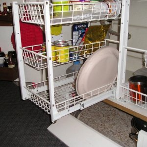 Two stacks of three pull out storage baskets