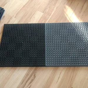 Bought some garage floor tiles from Costco. Choices were all black or gray/black.

I"m hoping this will help keep the feet clean and dry.