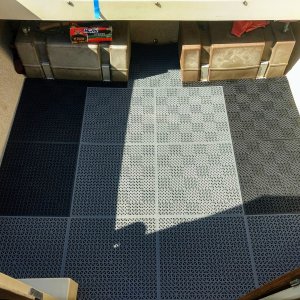 Laid it out using as many of the gray tiles as possible. There were 9 (18"x18") of each color.