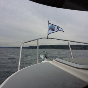 Off to our first night on the boat flying our new burgee
