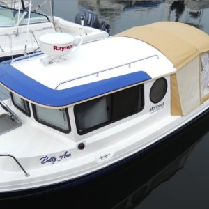 Betty Ann at Brewer Wickford Cove Marina in Naragansett Bay, Rhode Island..  The temperature was near 90, so we installed our window covers to keep out the sun.