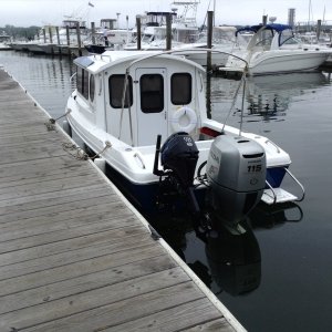 The Betty Ann without canvasback docked at Port Niantic