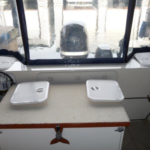 New Covers on cockpit box are:
"Imtra" 4000 Series Rectangular Hatch, Medium, Dream White, Item: SPA-40154
and the original factory covers are in lazerate.