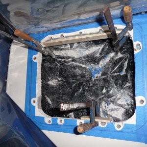 Starboard temporary wood form clampted in place and ready for thickened apoxy.