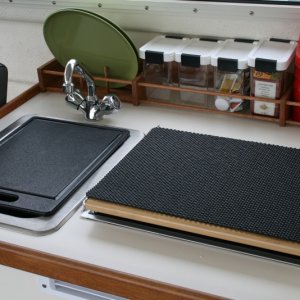 Cutting board and non-skid padding for top of the Wallace