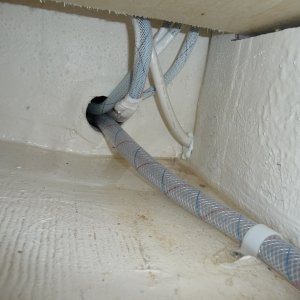 9. Wires and water line on the starboard side, under the 2 drawers, under the Wallas Stove, feeding into the chase below the cockpit floor across to the stern end of the water tank on the port side.