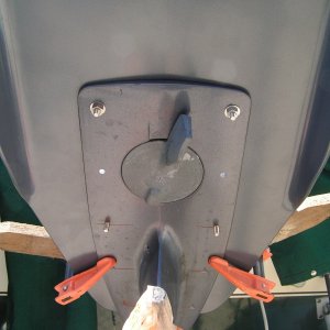 1/8 inch pilot holes are drilled first from underside, then 1/4 inch holes.