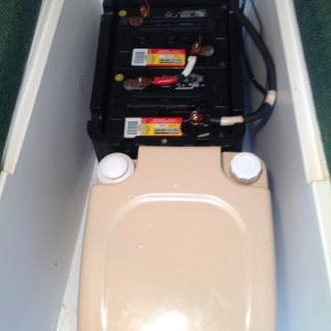 Auxiliary Battery Box located forward of porta potty.