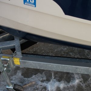Bunk guides stowed beneath forward part of the trailer during travel. Wed Feb 22 18:20:55 2012