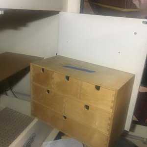 04 got a couple of IKEA drawer things on the inside of each door