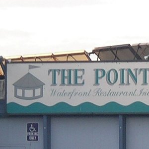 The resaurant at the entrance to the harbor. They would blow a loud horn when a boat would enter or leave.