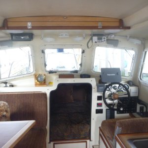 Helm & overhead storage door, holly & teak to compliment teak & holly floors.