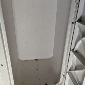 One of two sealed and vented propane compartments