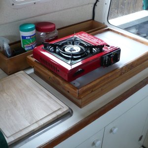 We wanted more counter space and storage so we removed the alcohol stove and use the portable butane cooker. These are great little stoves and boil water in 2 min.