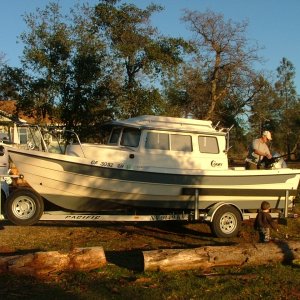 Dad & Wyatt prepping boat for fishing trip.