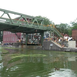 Town lift bridge in up position.  Here, the train tracks were just to the north of the canal, so when a train was going by there was quite a traffic jam.  Lots of tourists in town and one of the things to do way take pictures of the boats going under the bridge.