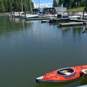 Landing the kayak in the marina dock to stay dry. The Advanced Elements inflatable has served me well for the last 15 years.