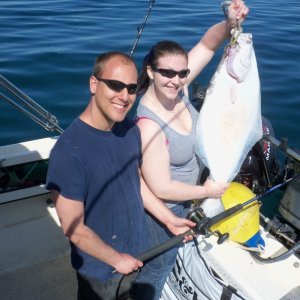 My friend Norm and girfriend Heidi with the first hali in the boat.