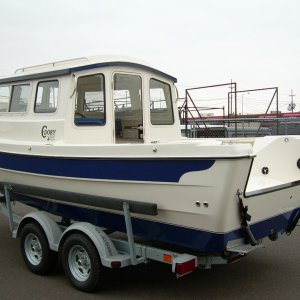 This is the first picture I ever saw of my actual boat. Here, she is sitting on Northwest Outlet's lot in Superior, WI.