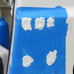 Starboard gelcoat was applied but did not fully fill the depressions. Cleaned with acetone and applied a second coat. After sanding level a few air bubbles showed so a third very light "wash" coat filled the bubbles and it ended up a perfect color match.