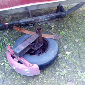 Oops.  Here is the Greek god Electrolysis at work on my neighbor's little boat trailer. This happened in the first mile, before he got up to speed out on the public road.