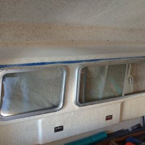 I'm adding some strips of mahogany across the top of the cabin to attach things to.

Sanded the mounting areas with some 40 grit to knock down the stipple and get a bit better adhesion.