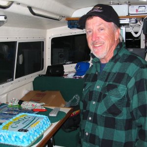 (TOPKICK) Jim cutting the cake