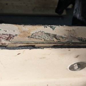 Port side transom, cap removed, below kicker bracket.