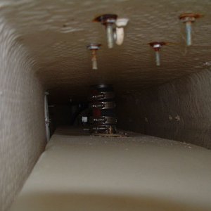 The filler hose is about a half inch longer than the two necks.