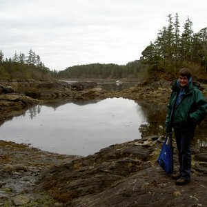 JoLee with the HunkyDory anchored in the background in Mirror Harbor.  Photo taken at the start of the one mile walk to the hot splrings