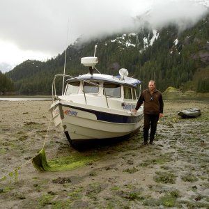 Jay with the HunkyDory purposely aground in Takatz Bay