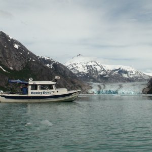 JoLee & the Hunkydory in front of Dawes Glacier at the head of Endicott Arm of Holkum Bay