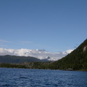 Approaching Piehle Passage & Khaz Head going north from Sitka on outer coast of Chichagof  Island Wilderness Area.  Sharp Mt in background rises directly above Sister Lake.