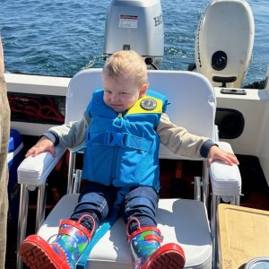 Grandson enjoying a sunny day cruise!