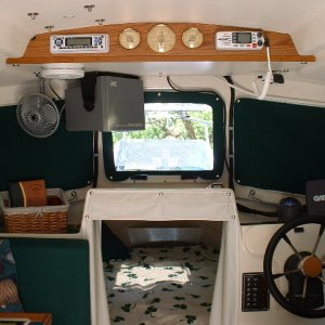 I finally got around to installing a new DSC radio. The screen and shades for the front windows were made by the same shop that did our camperback