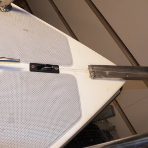 Here is the deck thru-hull block that sends the anchor line down the hawse pipe.  It has a string in it for now.