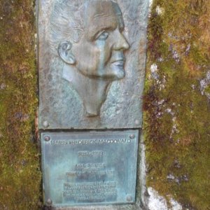 "Mac", the laird of Louisa Inlet.  Friend to all who visited.  His ashes are interred behind this plaque.