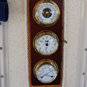 The WX Station is mounted with a hinged back for easy access to the clock battery & its adjustment.