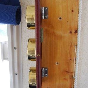 The backplate did not need to be screwed to the bulkhead, only secured with 3M adhesive (5200).