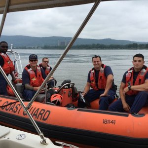 We love our Coast Guard.  Even when they board us for a safety inspection.