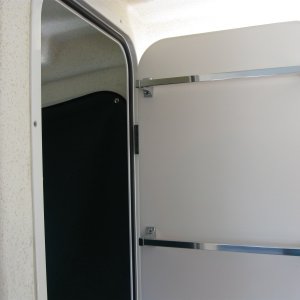 Towel bars inside head door.