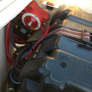 Starboard lazarette: Everything in place and hooked up. Since we're landlubbers, I went ahead and added a switch to the smart relay ground wire. Turning the switch to off disables the smartness of the smart relay ( no parasitic drain on the batteries while the boat is on the trailer on the side of the house).